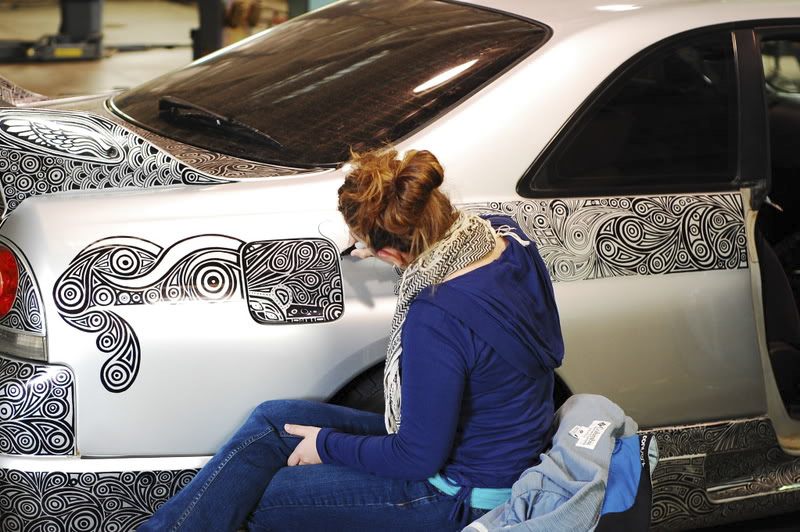 girl drawing doodle car