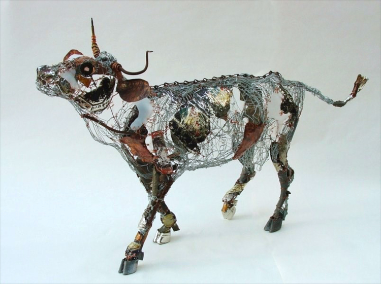 sculpture recycled material cow by barbara franc