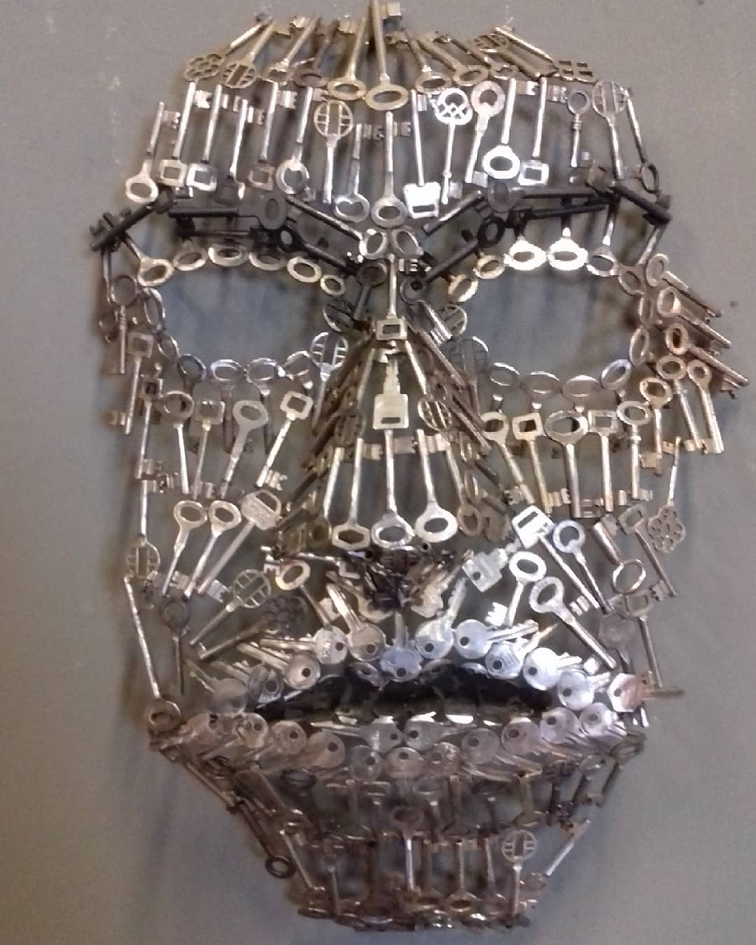 scrap metal sculpture face jos hammers