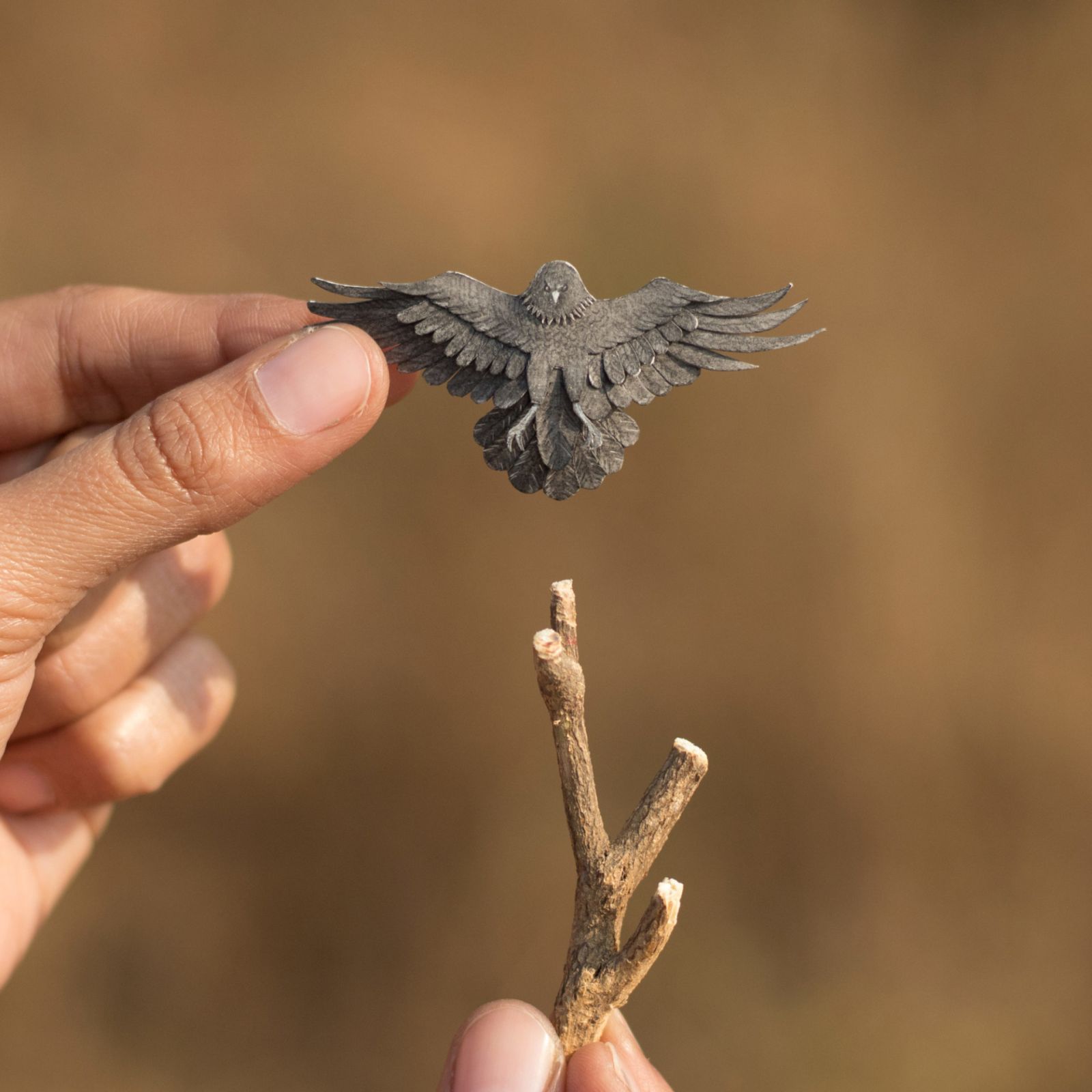 miniature paper art raven by nayan vaishali