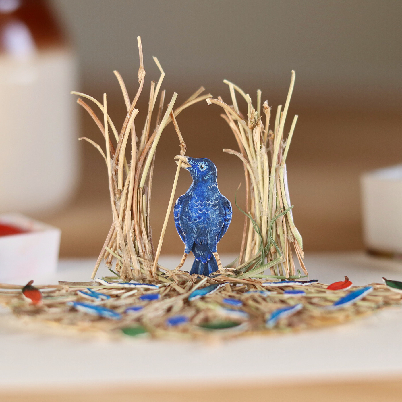 miniature paper art satin bowerbird by nayan vaishali