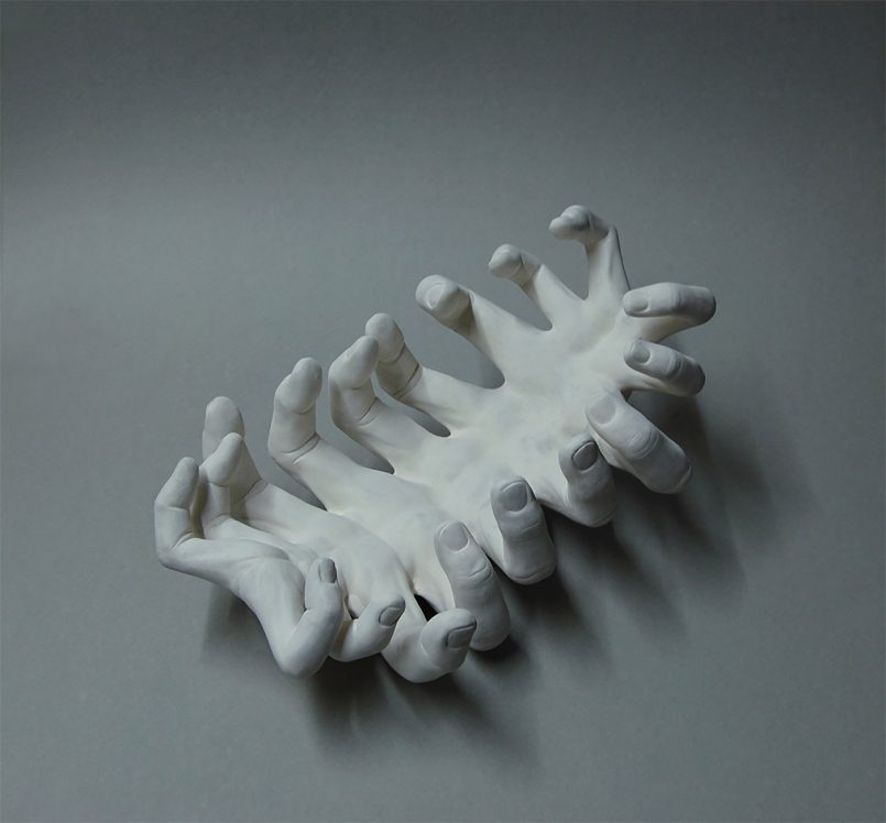 distorted human sculpture fingers by alessandro boezio