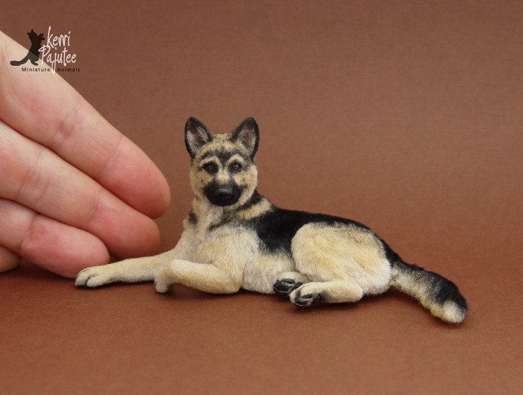 dog miniature animal sculpture by kerri pajutee