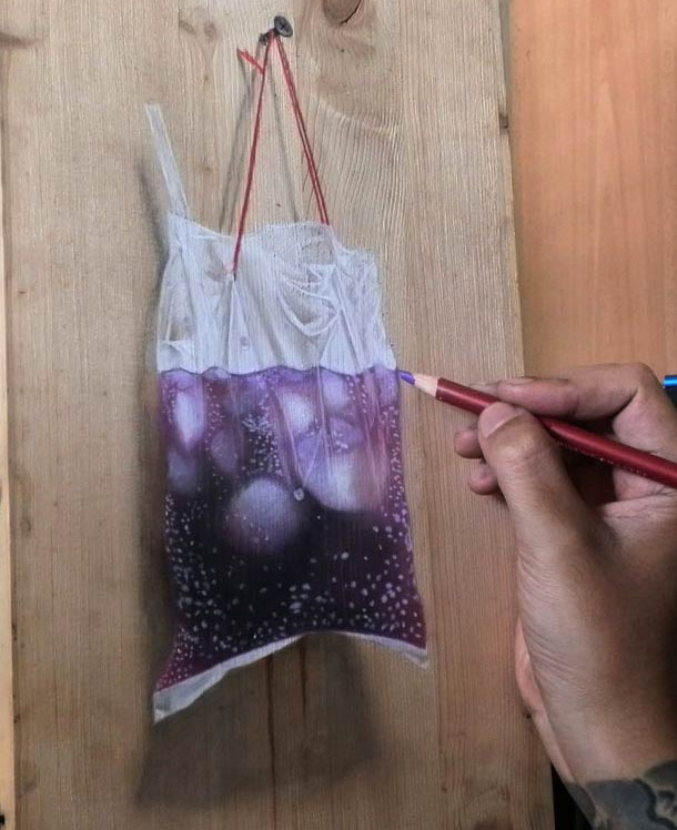 hyper realistic color pencil drawing juice bag by ivan hoo