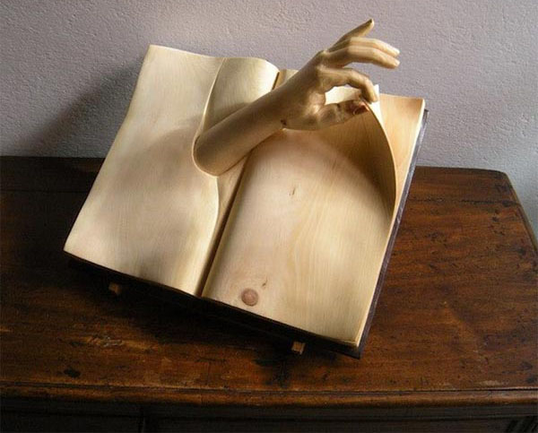 wood carving book and hand