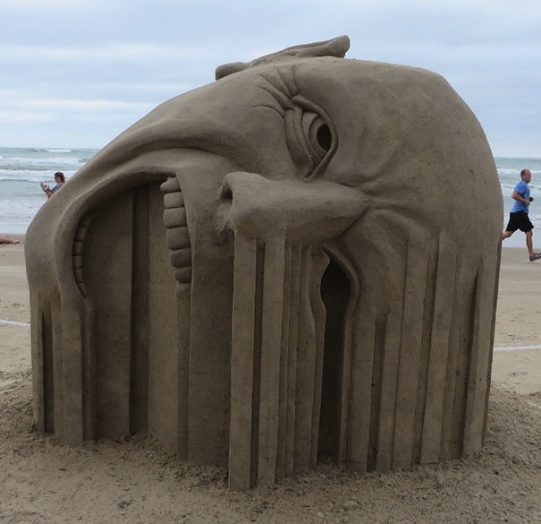 13 face sand sculptures