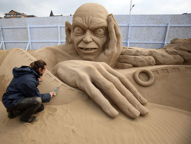 man sand sculptures
