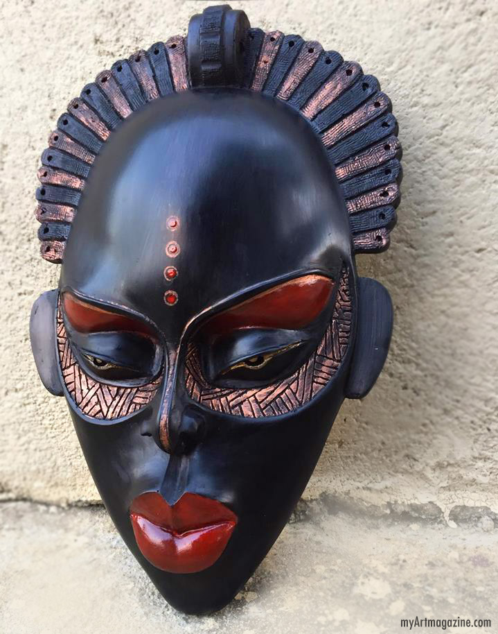 scultpure woman face by ghanaian